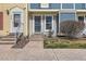 Close up of the entrance with charming design details and easy access at 9467 W Ontario Dr, Littleton, CO 80128