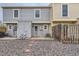 Rear exterior showcasing the patio area and well-maintained grounds at 9467 W Ontario Dr, Littleton, CO 80128