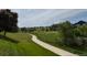 Beautifully maintained walking path with lush greenery and scenic views at 9467 W Ontario Dr, Littleton, CO 80128