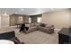 Finished basement with comfortable seating area at 228 Horizon Ave, Erie, CO 80516