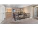 Upstairs hallway featuring hardwood floors and stylish railings. Modern lighting fixtures at 228 Horizon Ave, Erie, CO 80516