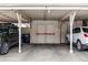 Covered parking area with designated parking spaces, providing convenient and protected parking at 160 Jackson St # 5, Denver, CO 80206