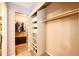 Spacious walk-in closet with shelving and ample storage space for clothing and personal items at 2459 S Xanadu Way # B, Aurora, CO 80014
