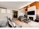 Inviting living room with sofa and fireplace. Comfortable seating and bright lighting at 2459 S Xanadu Way # B, Aurora, CO 80014