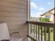 Relax on this outdoor balcony overlooking a cozy yard with great neighborhood views at 1456 Sepia Ave, Longmont, CO 80501