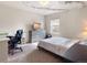 Bedroom featuring neutral carpet, a TV, and a window with natural light at 1456 Sepia Ave, Longmont, CO 80501