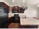 Well-equipped kitchen featuring stainless steel appliances and stylish countertops at 1456 Sepia Ave, Longmont, CO 80501