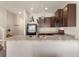Stylish kitchen boasting modern appliances, pendant lighting, and ample counter space at 1456 Sepia Ave, Longmont, CO 80501