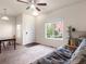 Bright living room with large windows, neutral carpet, and comfortable furnishings at 1456 Sepia Ave, Longmont, CO 80501