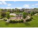Community playground and park featuring mature trees, lush lawn and landscaping at 1456 Sepia Ave, Longmont, CO 80501