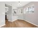 Bright dining room featuring wood floors and plenty of natural light at 350 Detroit St # 107, Denver, CO 80206