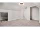 Spacious bedroom with plush carpeting, angled ceilings, and shelving in a bright, open layout at 1020 Kalamath St, Denver, CO 80204