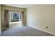 Neutral bedroom featuring a window with outside view, offering natural light and a pleasant atmosphere at 1016 Opal St # 102, Broomfield, CO 80020