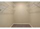 Walk-in closet with ample storage space, complete with adjustable shelving at 1016 Opal St # 102, Broomfield, CO 80020