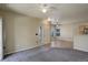 Inviting living area with neutral walls, plush carpet, ceiling fans, and ample natural light at 1016 Opal St # 102, Broomfield, CO 80020