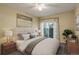 Comfortable primary bedroom with a large bed, stylish decor, and a relaxing ambiance at 1016 Opal St # 102, Broomfield, CO 80020