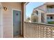 Outdoor patio space with a view of the neighborhood's landscaping and neighboring buildings at 1016 Opal St # 102, Broomfield, CO 80020