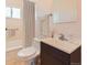 Clean bathroom with a modern vanity, sink, and shower-tub combo, designed for functionality and comfort at 1480 S Osceola St, Denver, CO 80219