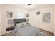 Serene bedroom featuring calming decor, plush bedding, and ample light, perfect for restful nights and relaxing mornings at 1480 S Osceola St, Denver, CO 80219