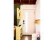 Bright and airy entry featuring modern decor, a statement door, and pops of yellow and pink at 7991 Stuart St, Westminster, CO 80030