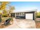 Charming single-story home featuring a well-manicured yard, accessible ramp, and attached garage at 7991 Stuart St, Westminster, CO 80030