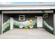 Outdoor garage patio with art and seating, perfect for relaxation and gatherings at 7991 Stuart St, Westminster, CO 80030