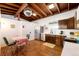 Charming kitchen with retro appliances, a cozy dining area, and hardwood flooring at 7991 Stuart St, Westminster, CO 80030