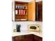 Kitchen cabinet shows contents and surrounding amenities at 7991 Stuart St, Westminster, CO 80030