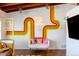 Vibrant living room with a fun disco theme, adding character and charm to the home at 7991 Stuart St, Westminster, CO 80030