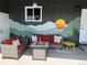 Cozy outdoor seating area with fire pit and mural at 7991 Stuart St, Westminster, CO 80030