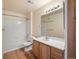 Bathroom with a vanity, toilet, shower and bathtub at 4747 S Balsam Way # 104, Littleton, CO 80123