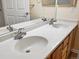 Bathroom featuring double sink vanity with plentiful counter space and cabinets at 4747 S Balsam Way # 104, Littleton, CO 80123