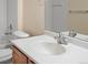 A close-up shot of a bathroom sink, mirror, and fixtures at 4747 S Balsam Way # 104, Littleton, CO 80123