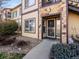 Close up view of the entrance with stone accents and walkway at 4747 S Balsam Way # 104, Littleton, CO 80123