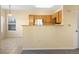 Open concept kitchen adjacent to a dining space offers convenience and style at 4747 S Balsam Way # 104, Littleton, CO 80123