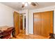 Bedroom with hardwood floors, closet and doorway visible at 2785 Skyline Dr, Westminster, CO 80030