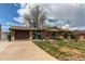 Charming brick ranch-style home with attached garage, well-maintained lawn, and mature trees at 2785 Skyline Dr, Westminster, CO 80030