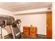 Home gym featuring treadmill and an exercise center with a small cabinet at 2785 Skyline Dr, Westminster, CO 80030