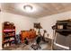 Home gym featuring treadmill, weights, media center, and exercise bike at 2785 Skyline Dr, Westminster, CO 80030