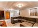Spacious basement living room with plush sectional couch at 2785 Skyline Dr, Westminster, CO 80030