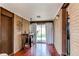 Cozy sun room with brick walls and access to the backyard at 2785 Skyline Dr, Westminster, CO 80030