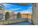 Balcony offering views of trees and another building on a sunny day at 13961 E Marina Dr # 409, Aurora, CO 80014