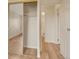 Bedroom area featuring hardwood floors and a mirrored closet and en suite bathroom at 13961 E Marina Dr # 409, Aurora, CO 80014