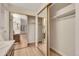 Walk-in closet with sliding mirrored doors and shelving at 13961 E Marina Dr # 409, Aurora, CO 80014