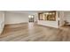 Spacious living room with wood floors and a decorative room divider at 13961 E Marina Dr # 409, Aurora, CO 80014