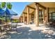 Outdoor patio with ample seating, perfect for enjoying the beautiful views and fresh air near the clubhouse at 13961 E Marina Dr # 409, Aurora, CO 80014