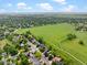 Aerial view of a beautiful home nestled in a serene neighborhood with easy access to green spaces at 236 W Sycamore Ln, Louisville, CO 80027