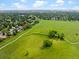 Explore this picturesque neighborhood with sprawling green fields and a network of walking trails from above at 236 W Sycamore Ln, Louisville, CO 80027