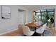 Well-lit dining area with hardwood floors and comfortable seating at 236 W Sycamore Ln, Louisville, CO 80027