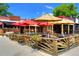 Inviting outdoor seating area with umbrellas, planters, and a cozy atmosphere, perfect for dining at 236 W Sycamore Ln, Louisville, CO 80027